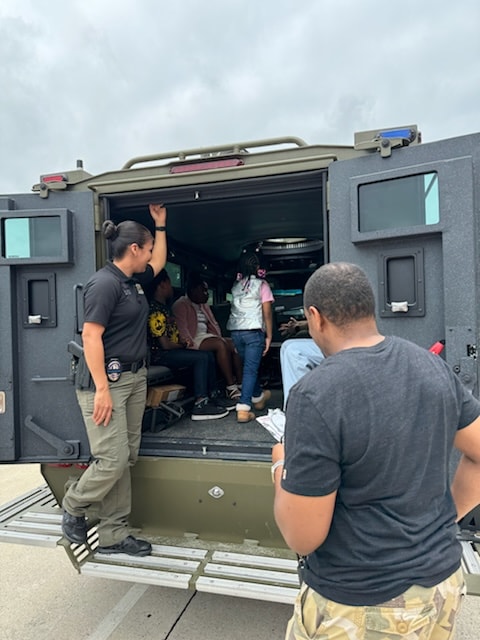 Gideon Training Solutions instructor Hilton Jackson representing the Cook Children's Aim for Safety program at a community outreach event in DeSoto, Texas. Firearms safety education for families, schools, churches, and community organizations across the DFW area. Firearms safety education DeSoto Texas. Community gun safety program Dallas County. Cook Children's Aim for Safety DFW.