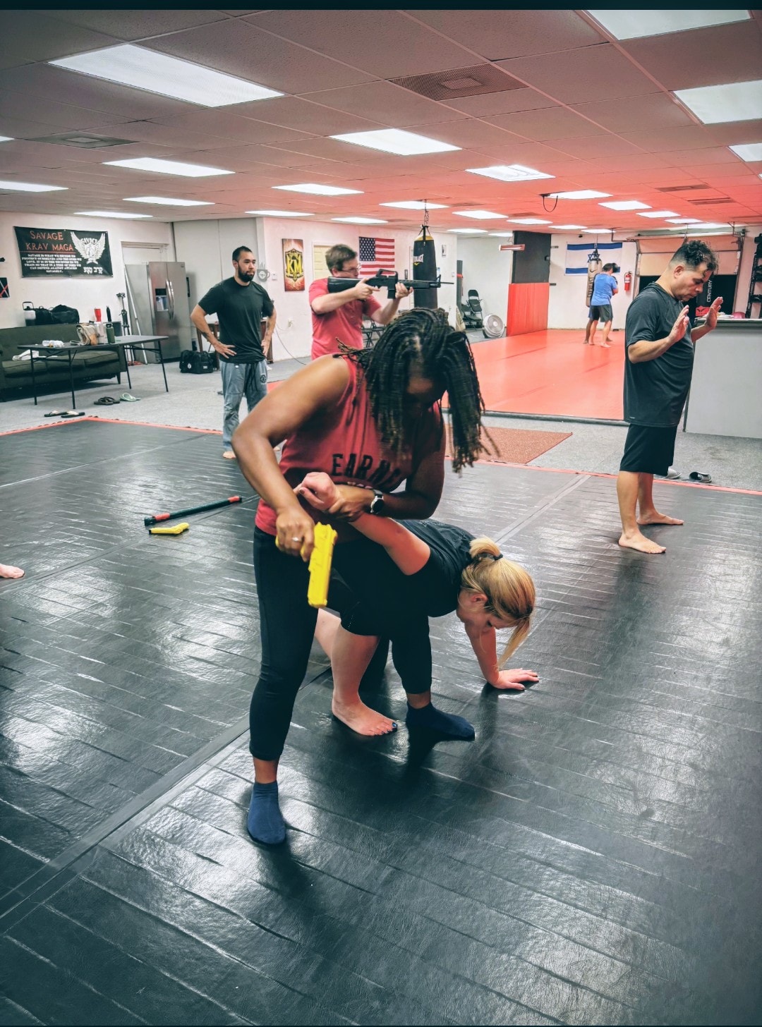 Women participating in an empowering Ladies Self-Defense Training course with Gideon Training Solutions certified female-friendly instructors. Three to four hour course covering practical self-defense skills, situational awareness, and personal protection strategies for women with or without a firearm. Ladies self-defense class available in Dallas, Fort Worth, Mansfield, Arlington, Grand Prairie, DeSoto, and across all DFW and North Texas cities.